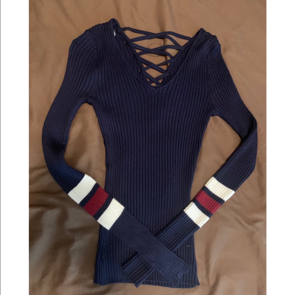 Very fitted knitted lace back blouse